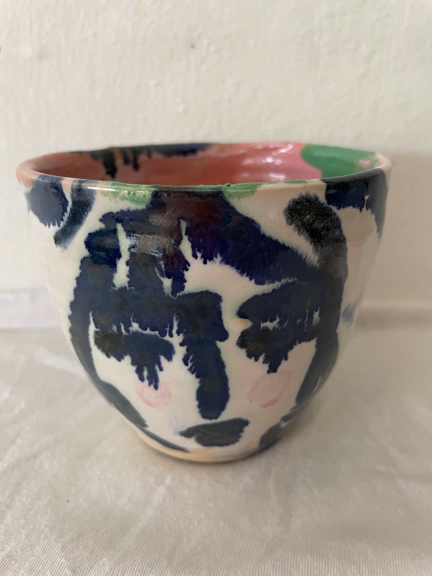 Two faces cup