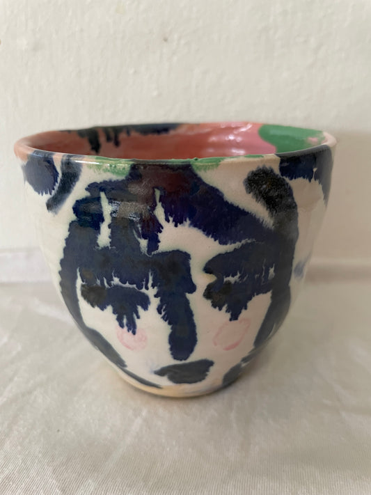 Two faces cup