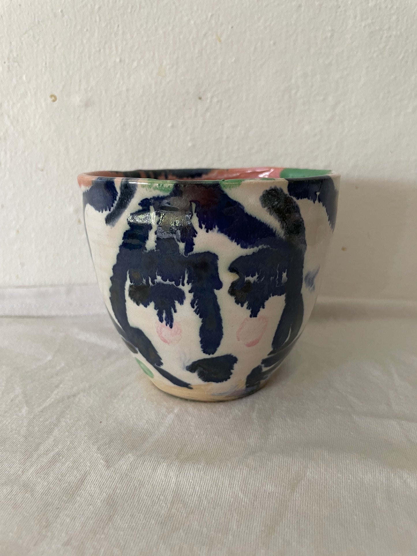 Two faces cup